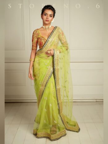 THE QUEEN’S LUSTROUS LIME SAREE
